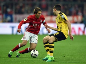 Die Niederlagen gegen Real und Dortmund ändern nichts: Philipp Lahm (l) hört auf. Foto: Andreas Gebert