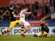 Der Einsatz von Dortmunds Sven Bender (l) und Sokratis (hier gegen Kölns Simon Zoller) ist noch fraglich. Foto: Jonas Güttler/Archiv