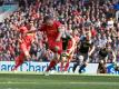 Liverpools James Milner (M) verschießt einen Elfmeter gegen Southampton. Foto: Peter Byrne