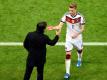 Zwischen Marco Reus (r) und Bundestrainer Joachim Löw steht noch ein Gespräch an. Foto: Hendrik Schmidt