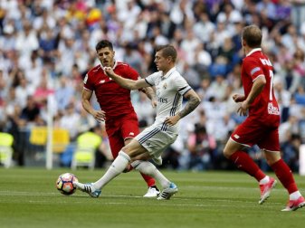 Real-Regisseur Toni Kroos (M.) traf gegen Sevilla und will nun Meister werden. Foto: Francisco Seco Real-Regisseur Toni Kroos (M.) traf gegen Sevilla und will nun Meister werden. Foto: Francisco Seco