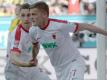 Alfred Finnbogason (r) macht sich und der Mannschaft Mut: «Wir müssen nicht in die Relegation.» Foto: Stefan Puchner