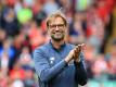 Jürgen Klopp führte den FC Liverpool auf Platz vier. Foto: Peter Byrne