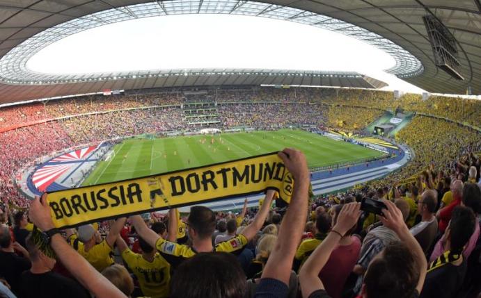Die Fans von Borussia Dortmund werden wieder im Berliner Olympiastadion zu Gast sein. Foto: Peter Kneffel