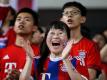 Chinesische Fans des FC Bayern München in Shanghai. Foto: Xi Ya