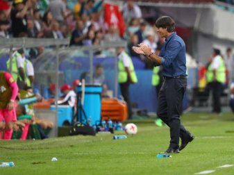 Bundestrainer Joachim Löw war zufrieden mit dem Sieg. Foto: Christian Charisius Bundestrainer Joachim Löw war zufrieden mit dem Sieg. Foto: Christian Charisius