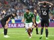 Mexikos Oribe Peralta (M) jubelt über seinen Treffer zum 2:1 gegen Neuseeland. Foto: Martin Meissner