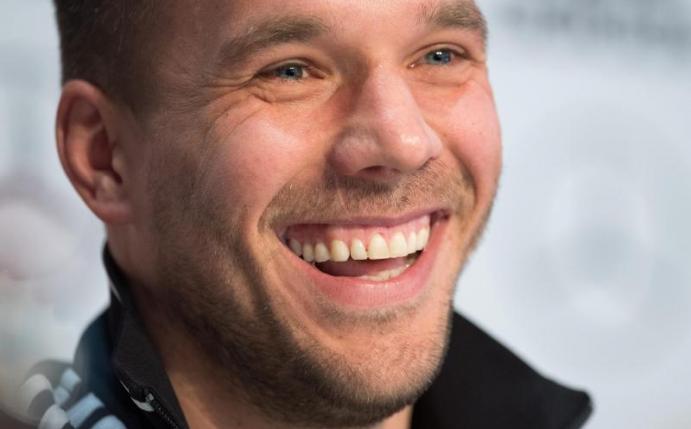 Lukas Podolski freut sich auf die japanische Kultur. Foto: Marius Becker