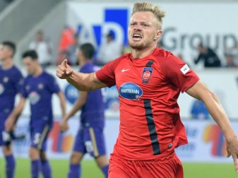 Heidenheims Marcel Titsch-Rivero jubelt nach dem Siegtreffer gegen Aue. Foto: Stefan Puchner Heidenheims Marcel Titsch-Rivero jubelt nach dem Siegtreffer gegen Aue. Foto: Stefan Puchner