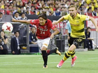 Takahiro Sekine (l) wechselt von Japan nach Ingolstadt . Foto: Kyodo Takahiro Sekine (l) wechselt von Japan nach Ingolstadt . Foto: Kyodo