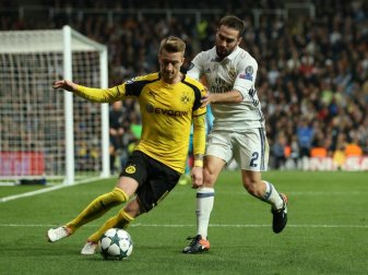 Sehen sich auch in dieser Saison in der Champions League: Dortmunds Marco Reus (l) und Real-Profi Daniel Carvajal. Foto: Friso Gentsch Sehen sich auch in dieser Saison in der Champions League: Dortmunds Marco Reus (l) und Real-Profi Daniel Carvajal. Foto: Friso Gentsch