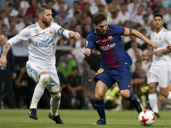Sergio Ramos (l.) und Lionel Messi (r.) im Zweikampf Sergio Ramos (l.) und Lionel Messi (r.) im Zweikampf