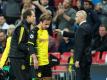 BVB-Star Mario Götze (M.) verletzte sich an den Zähnen. Foto: Bernd Thissen