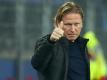 Trainer Markus Gisdol hat acht Punktspiele ohne Sieg im Nacken, aber auch Rückendeckung des HSV. Foto: Christian Charisius