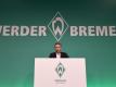 Frank Baumann, Geschäftsführer Sport von Werder Bremen, spricht bei der Mitgliederversammlung. Foto: Carmen Jaspersen