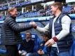 HSV-Trainer Markus Gisdol (l) trifft auf Hoffenheims Coach Julian Nagelsmann. Foto: Christian Charisius