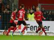 Freiburgs Nils Petersen (r) jubelt über seinen Treffer gegen Mainz. Foto: Patrick Seeger