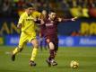 Lionel Messi (r) enteilt Villarreals Rodrigo. Foto: Gtres