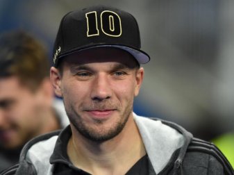 Lukas Podolski liebt den 1. FC Köln. Foto: Uwe Anspach Lukas Podolski liebt den 1. FC Köln. Foto: Uwe Anspach