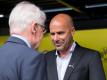 BVB-Präsident Reinhard Rauball im Gespräch mit Peter Bosz. Foto: Guido Kirchner