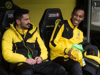 Der frühere Dortmunder Ilkay Gündogan (l) kritisiert den gewechselten Pierre-Emerick Aubameyang. Foto: Bernd Thissen Der frühere Dortmunder Ilkay Gündogan (l) kritisiert den gewechselten Pierre-Emerick Aubameyang. Foto: Bernd Thissen