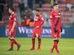 Die Leverkusener um Julian Baumgartlinger, Karim Bellarabi und Kai Havertz (l-r) kassierten eine Heimniederlage. Foto: Bernd Thissen