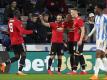 Manchesters Romelu Lukaku (l, 9) feiert mit den Mitspielern sein zweites Tor beim FA Cup. Foto: Martin Rickett/PA Wire