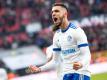 Nabil Bentaleb schreit seine Freude über sein Elfmetertreffer in Leverkusen laut heraus. Foto: Marius Becker
