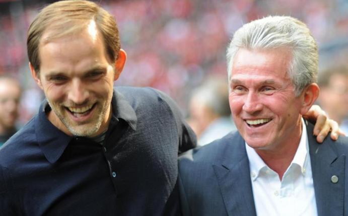 Jupp Heynckes (r) und Thomas Tuchel unterhalten sich 2012 vor Beginn einer Bundesliga-Partie. Foto: Andreas Gebert