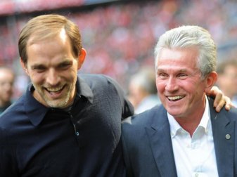 Jupp Heynckes (r) und Thomas Tuchel unterhalten sich 2012 vor Beginn einer Bundesliga-Partie. Foto: Andreas Gebert Jupp Heynckes (r) und Thomas Tuchel unterhalten sich 2012 vor Beginn einer Bundesliga-Partie. Foto: Andreas Gebert