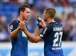 Die Hoffenheimer Mark Uth (l) und Andrej Kramaric sind vor dem Spiel gegen den VfL Wolfsburg angeschlagen. Foto: Uwe Anspach