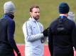 Coach Gareth Southgate (M.) bastelt an einem englischen WM-Team. Foto: Mike Egerton/PA Wire