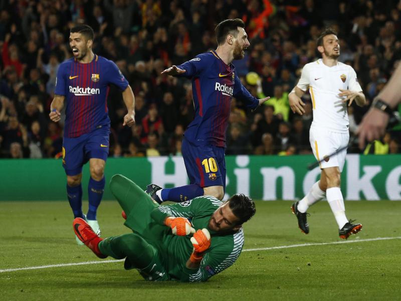 Lionel Messi (M) vom FC Barcelona jubelt über den Treffer zum 1:0 gegen AS Rom. Foto: Manu Fernandez/AP