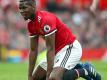 Uniteds Paul Pogba konnte die Heimniederlage nicht verhindern und kniet nach Abpfiff enttäuscht auf dem Rasen. Foto: Nick Potts/PA Wire