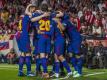 Die Barca-Spieler jubeln über den Sieg im Pokal-Finale gegen den FC Sevilla. Foto: Juan Jose Ubeda