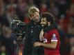 Wollen ins Champions-League-Finale: Liverpool-Coach Jürgen Klopp (l) und Mohamed Salah. Foto: Dave Thompson