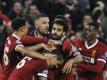 Liverpools Mohamed Salah (M) jubelt mit seinen Teamkollegen über seinen Treffer zum 1:0 gegen die Roma. Foto: Rui Vieira/AP