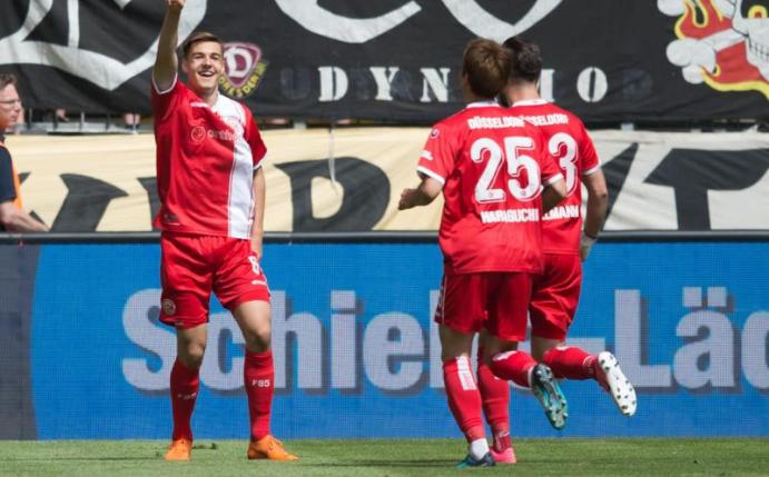 Fortunas Florian Neuhaus (l) jubelt nach seinem Tor zum 0:1 bei Dynamo Dresden. Foto: Sebastian Kahnert