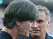 Bundestrainer Joachim Löw (l) spricht vor dem Finale mit U21-Bundestrainer Stefan Kuntz. Foto: Cezaro De Luca