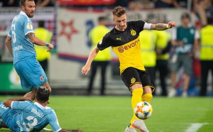 Marco Reus (r) traf für den BVB zur 1:0-Führung. Foto: Marius Becker