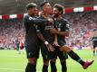 Liverpools Roberto Firmino (2.v.r) feiert sein Tor zum 2:0 mit Alex Oxlade-Chamberlain (l) und Mohamed Salah. Foto: Steven Paston/PA Wire
