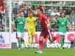 Hat seinen Vertrag mit Fortuna Düsseldorf vorzeitig verlängert: Kaan Ayhan (M) jubelt über einen Treffer. Foto: Carmen Jaspersen