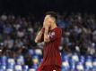 Roberto Firmino vom FC Liverpool schlägt nach der Niederlage in Neapel seine Hände vors Gesicht. Foto: Gregorio Borgia/AP