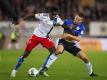 Bakery Jatta (l) spielt in der 2. Liga für den Hamburger SV. Foto: Friso Gentsch/dpa