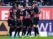 Die Eintracht-Spieler feierten einen klaren Sieg gegen die Bayern. Foto: Uwe Anspach/dpa