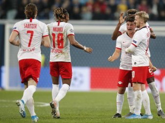 Die Spieler von RB Leipzig feiern ein Tor gegen Zenit St. Petersburg. Foto: Dmitri Lovetsky/AP/dpa Die Spieler von RB Leipzig feiern ein Tor gegen Zenit St. Petersburg. Foto: Dmitri Lovetsky/AP/dpa