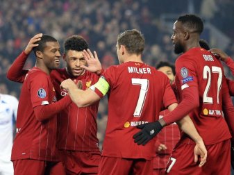 Die Spieler vom FC Liverpool feiern das 1:0 gegen Genk. Foto: Jon Super/AP/dpa Die Spieler vom FC Liverpool feiern das 1:0 gegen Genk. Foto: Jon Super/AP/dpa