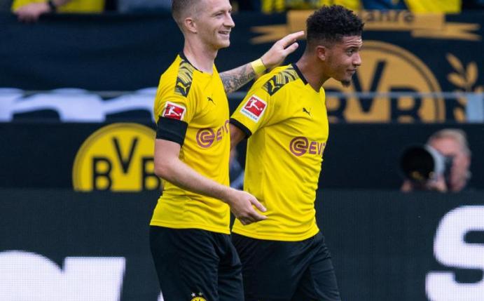 Drohen dem BVB gegen Bayern auszufallen: Jadon Sancho (r) und Marco Reus. Foto: Guido Kirchner/dpa