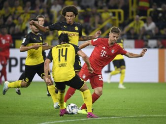 Borussia Dortmund gastiert zum Spitzenspiel in München Borussia Dortmund gastiert zum Spitzenspiel in München