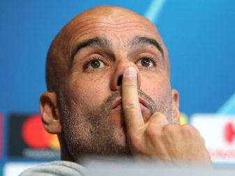 Besitzt bei Manchester City noch einen Vertrag bis 2021: Ex-Bayern-Trainer Pep Guardiola. Foto: Martin Rickett/PA Wire/dpa